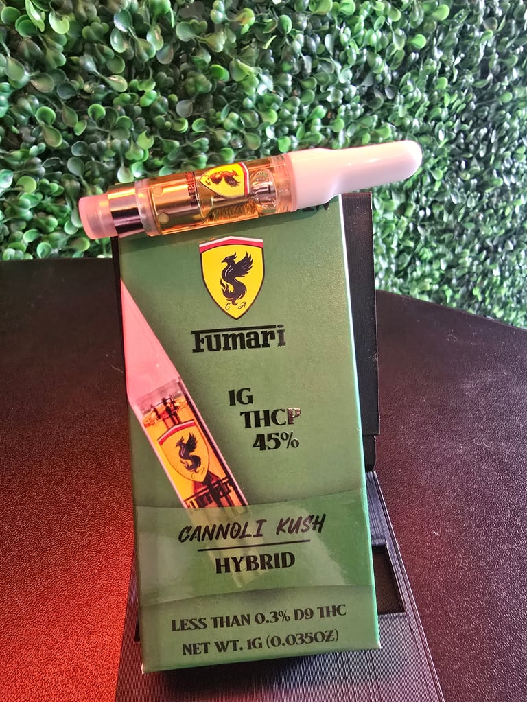 Fumari cannabis product showing HHCP vape cartridge on green packaging labeled Cannoli Kush hybrid strain