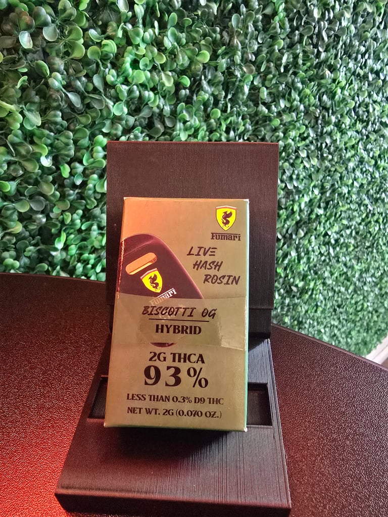 Cannabis product package labeled Livi Hash Rosin Biscotti OG Hybrid with 93% THCA potency, displayed on brown surface with green ivy background